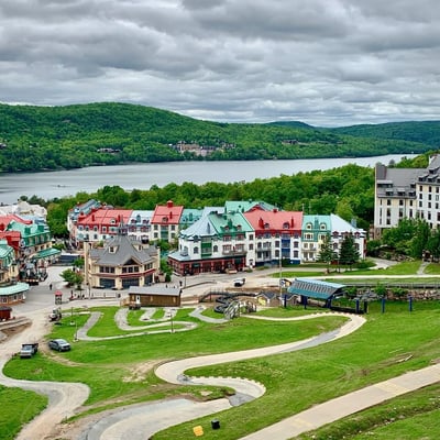 An overview of the Luge tracks with a stunning view of Mont Tremblant behind.